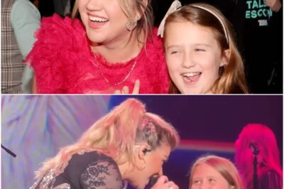 Kelly Clarkson Brought The Crowd To Tears When She Shared A Heartwarming Moment With Her Daughter On Stage! Her 9-Year-Old, River Rose, Made A Surprise Appearance As Kelly Gently Took Her Hand And Guided Her Into The Spotlight, Sending Thousands Of Fans Into A Frenzy. The Mother-Daughter Duo Delivered A Stunning Rendition Of “Heartbeat Song,” Their Voices Blending Beautifully In A Performance Overflowing With Emotion. Despite The Ups And Downs In Kelly’s Personal Life, Her Deep Connection With River Remains Unshaken. This Unforgettable Moment Proved That Music Truly Runs In Their Blood! Watch It Now Here!