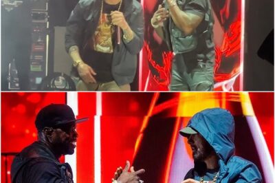 As 50 Cent Was Performing Enthusiastically, Eminem Walked In! His Unexpected Appearance Sent Over 15,000 Fans At Pine Knob Music Theatre Into A Frenzy Of Excitement! The Two Took The Stage Together To Treat Their Fans To A Musical Feast, Performing Their Hit Song “Crack A Bottle” In Perfect Harmony! Truly, They Are A Dynamic Duo, Both Off And On Stage! (TB)