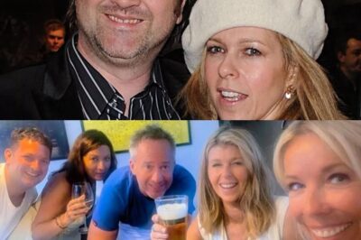 Good Morning Britain host Kate Garraway surrounded herself by her pals as she lifted a drink to her late husband Derek Draper following his tragic death last year aged 56