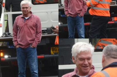 Phillip Schofield watches his £60k car being towed away after scary crash
